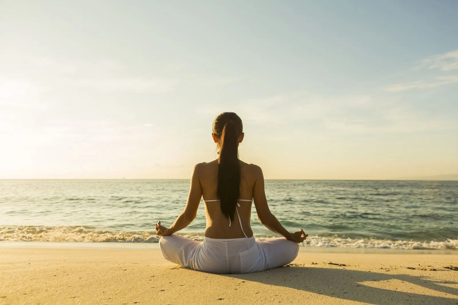 Beachfront wellness lifestyle image from the Hiranandani Sands Alibaug listing site
